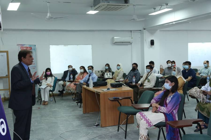 Prof. Dr. Atif Kazmi during his lecture to the faculty and house officers of University College of Dentistry, University of Lahore.